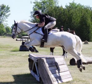 Alexa Bresnahan & Strider jumping a big corner at the Jessica Phoenix Clinic at Oakhurst this week. Photo by: Barry Brenahan