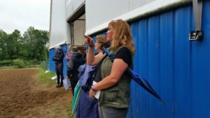 The Oakhurst crew watching Alexa Bresnahan warm up at the Rainbow Ridge Dressage Show.