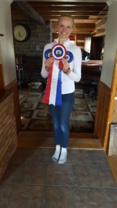 Emma Richardson showing off the ribbons she and Sokit2ya (Sox) won at the Dewmont Silver Dressage Show.