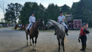 Sox and Mario exchanging prancing tips between dressage tests - Emma Richardson & Sokit2ya and Jackie Naida & Mario with super groom and support Cindy Moore at the Dewmont Silver Dressage Show.