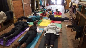 Dr. Lindsay Buchan stretching with the Oakhurst Show Team. 